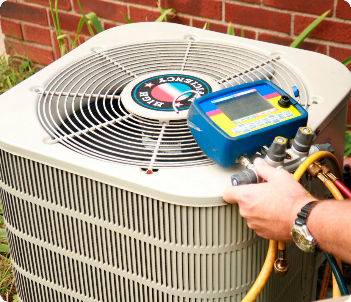 Air conditioning unit with maintenance tools attached.